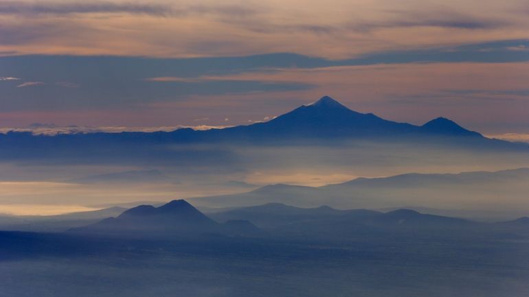 Mexico's highest peak and the third highest in North America,...