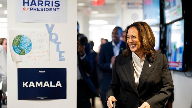 Vice President Kamala Harris arrives at her campaign headquarters in...