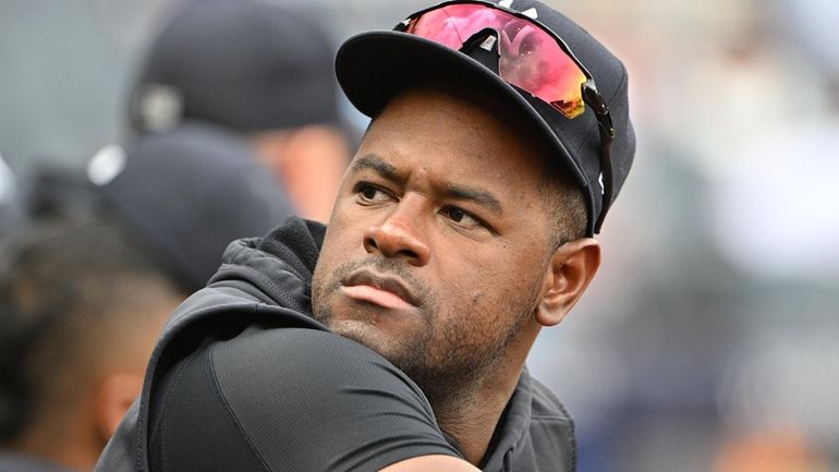  Luis Severino looks on from the dugout during a game between...