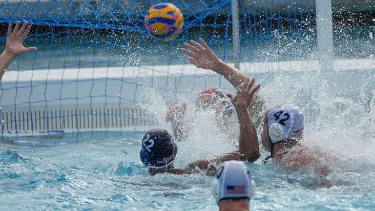 U.S. Men's Olympic Water Polo team captain Ben Hallock, far...