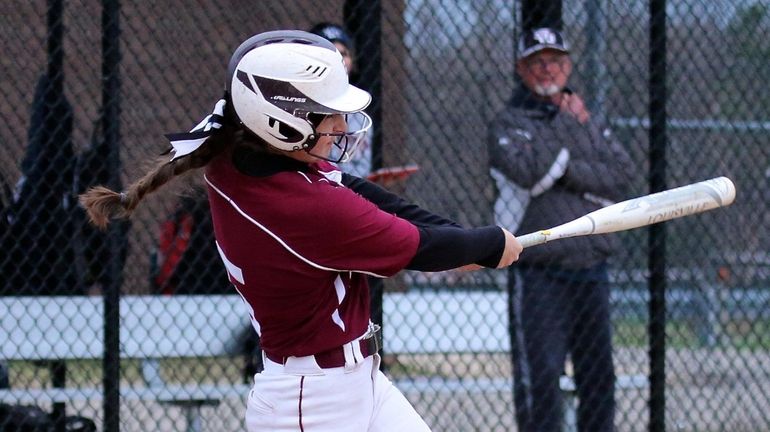 Bay Shore's Julia Carpenter watches the flight of her game-winning...