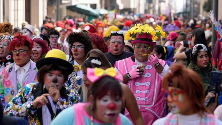 Clowns march celebrating The Day of the Peruvian Clown, in...