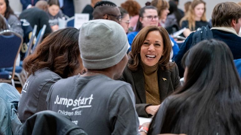 Vice President Kamala Harris works on a Martin Luther King Jr. day...