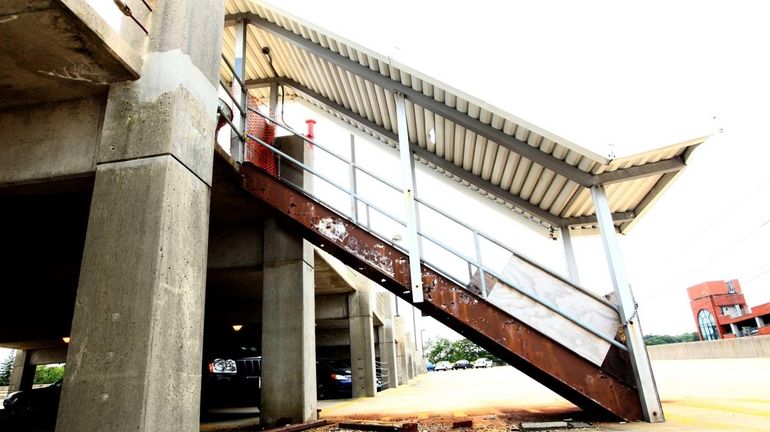 The south parking structure has cracked concrete throughout the garage...