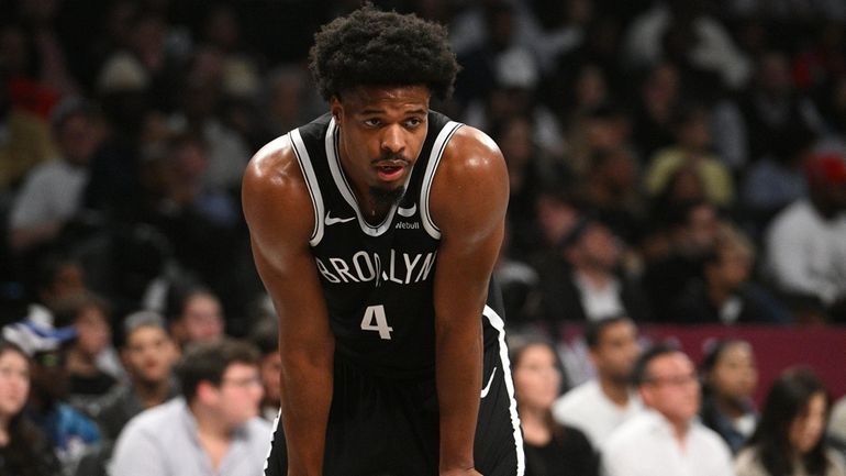 Nets guard Dennis Smith Jr. looks on against the Cleveland...