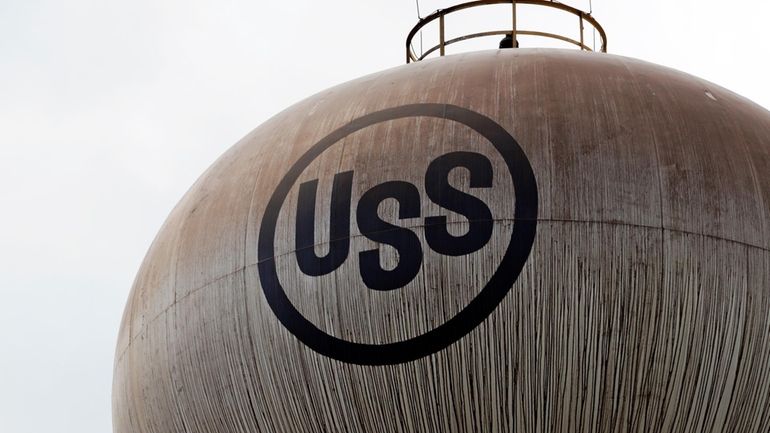 A U.S. Steel logo is seen on a water tower,...