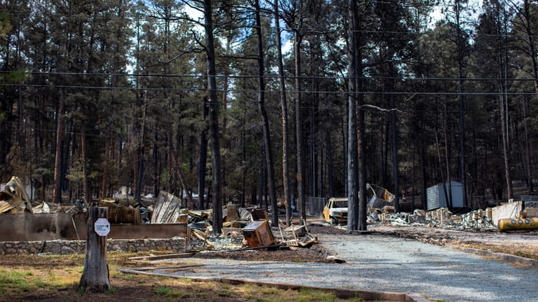 Houses destroyed by the South Fork Fire are pictured in...