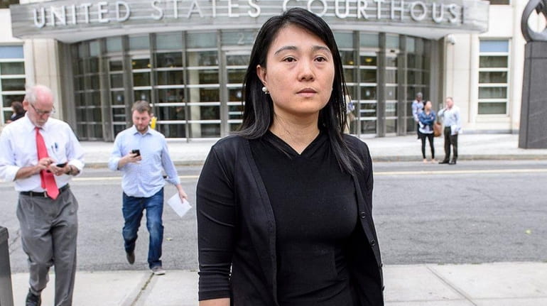 Ying Lin, of Flushing, Queens, leaves court Tuesday , Sept....