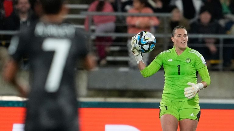 Philippines' goalkeeper Olivia McDaniel waits to kick the ball down...