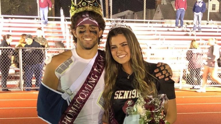 Mepham High School homecoming king and queen Anthony Novello and...