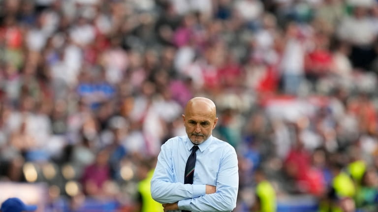 Italy's head coach Luciano Spalletti reacts during a round of...