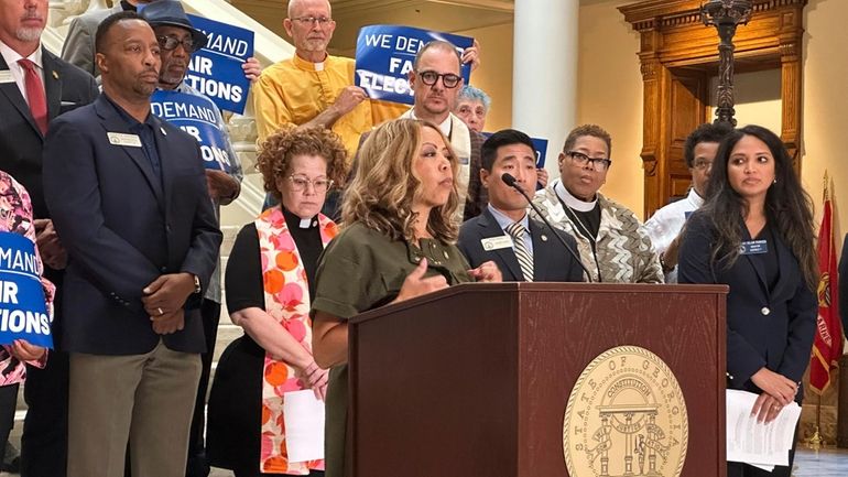 U.S. Rep Lucy McBath (D-Ga.) speaks at a news conference...