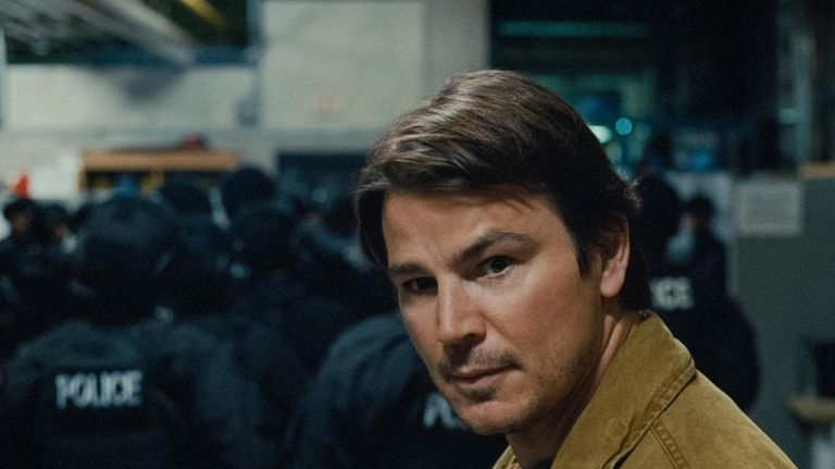 This image released be Warner Bros. Pictures shows Josh Hartnett...