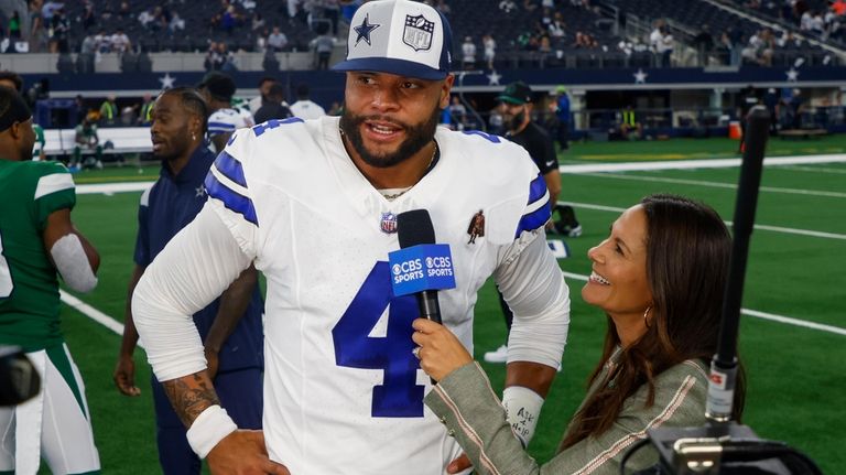 Dallas Cowboys quarterback Dak Prescott is interviewed after their win...