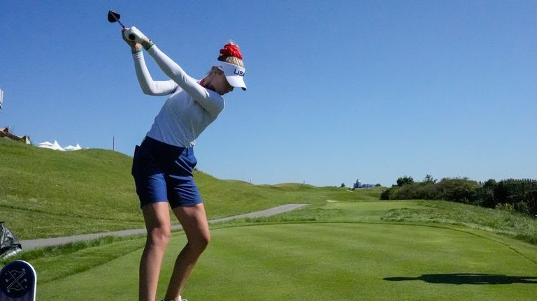 Nelly Korda, of the United States, hits from the seventh...