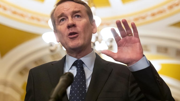 Sen. Michael Bennet, D-Colo., speaks on Capitol Hill, Feb. 27,...