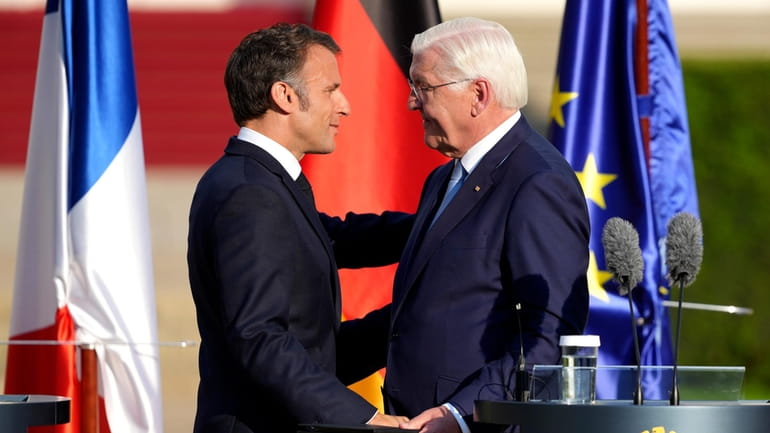 German President Frank-Walter Steinmeier, right, and French President Emmanuel at...