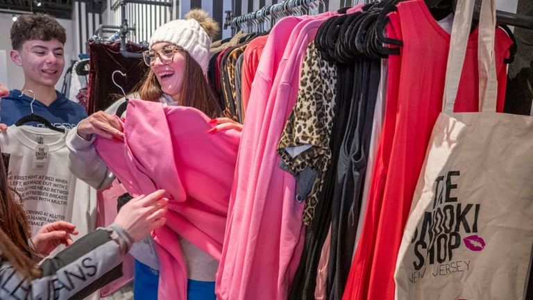 Nico Barbarisi, 17, of Westbury, left, and Emily Boston, 21,...