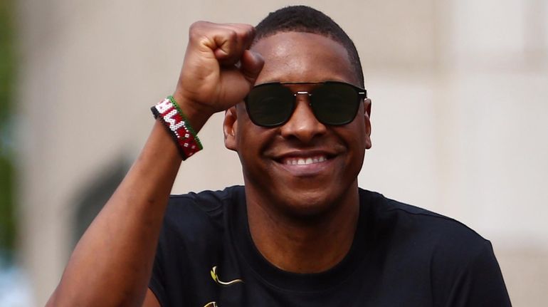 Raptors president Masai Ujiri waves during the team's NBA Finals...