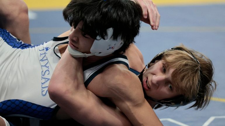 Brayden Fahrbach of Mt. Sinai defeats Leo Tansey of Collegiate...