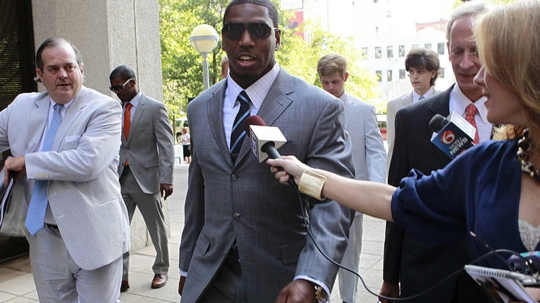 Suspended New Orleans Saints linebacker Jonathan Vilma arrives to testify...
