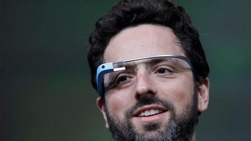 Google co-founder Sergey Brin demonstrates Google's new Glass, wearable internet...