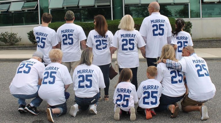 Tommy Murray's family and friends sported T-shirts with Murray's baseball...