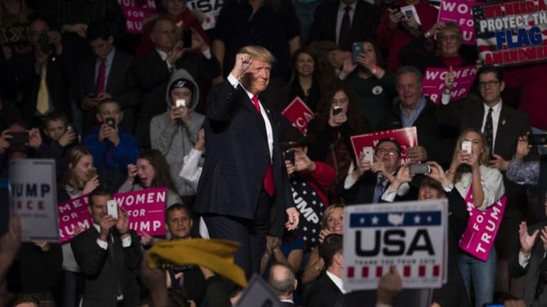 President-elect Donald Trump arrives for a rally in Hershey, Pa.,...