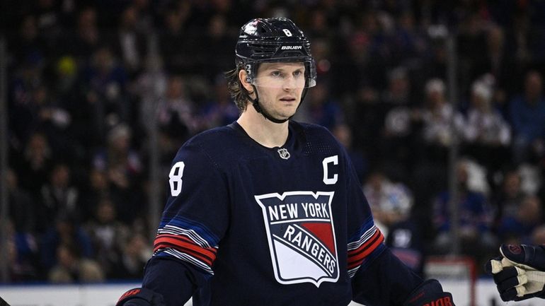 Rangers defenseman Jacob Trouba looks on against the Lightning in the...