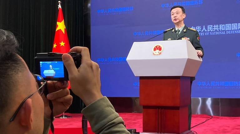 Defense Ministry spokesperson Wu Qian speaks during a press conference...