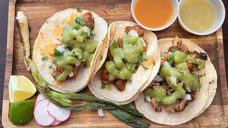 Pork carnitas tacos are on the menu at the new...