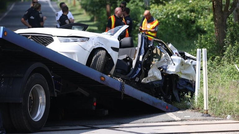 A train struck a taxi cab on Wading River Road in...