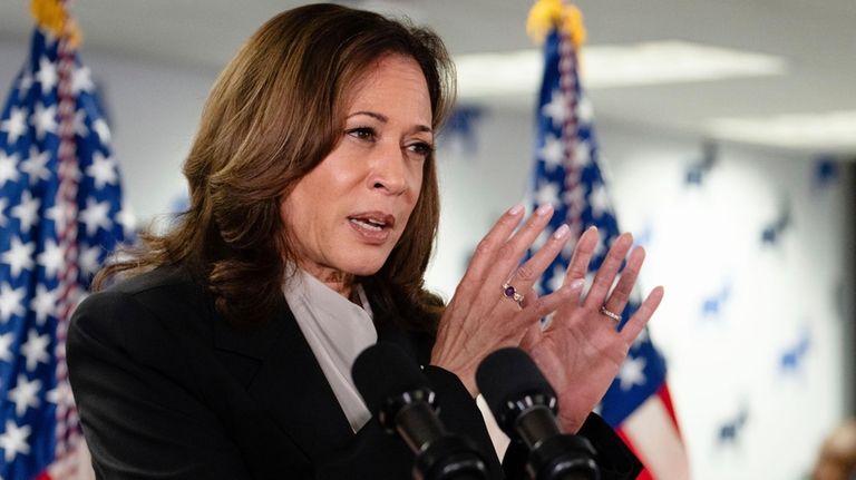 Vice President Kamala Harris speaks at her campaign headquarters in...