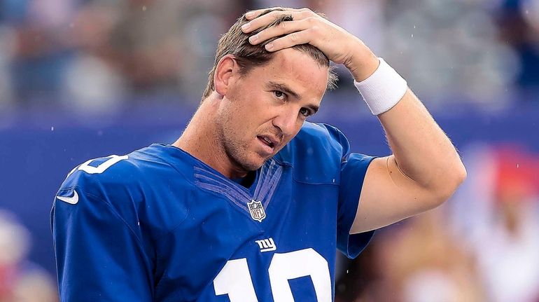 Giants quarterback Eli Manning during warm up prior to the...