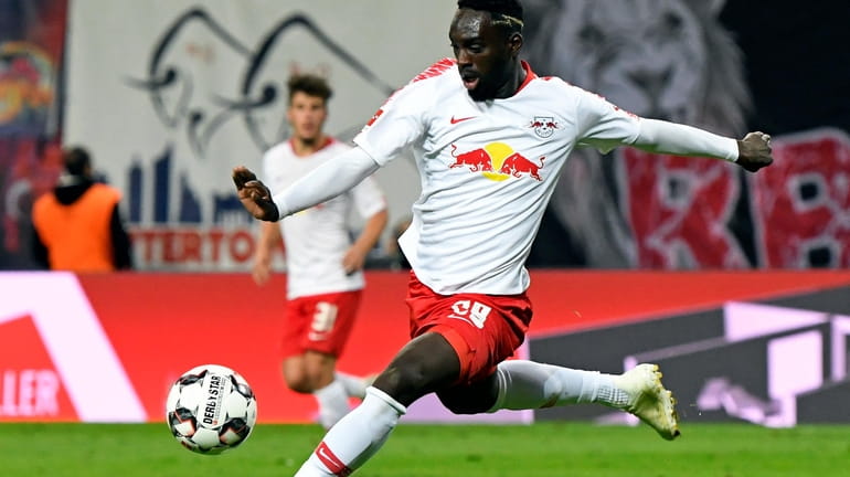 Leipzig's Jean-Kevin Augustin scores his side's 2nd goal during the...