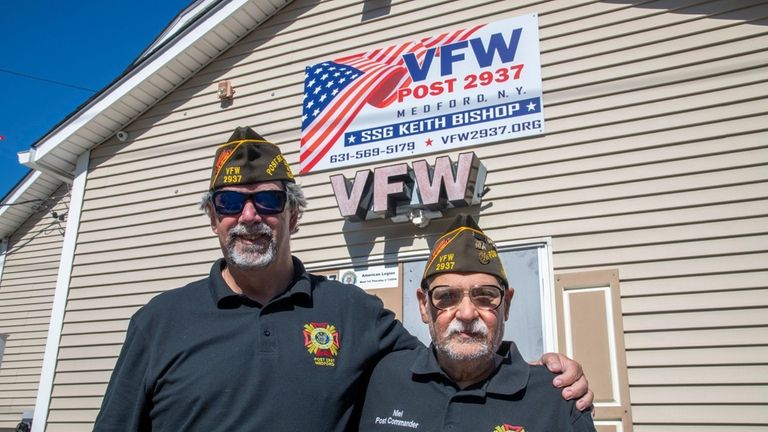 Army veteran John Reuter, left, spearheaded the effort to rename...