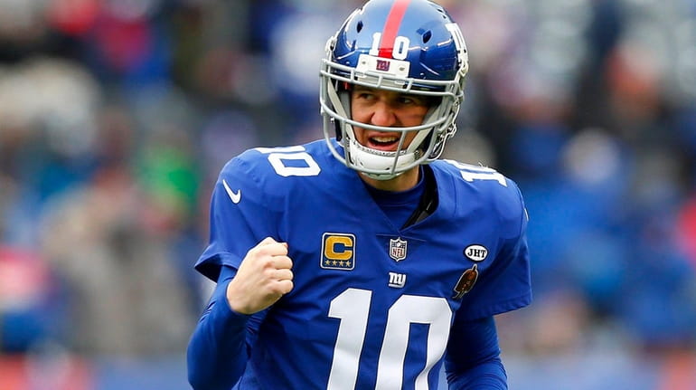Eli Manning looked miserable when his brother locked up a second
