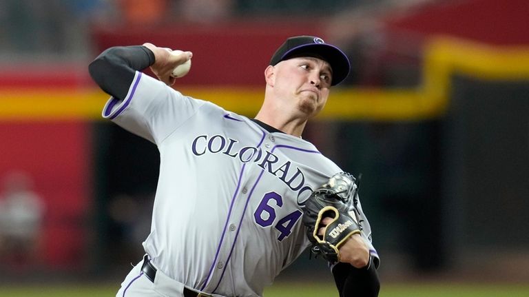 Colorado Rockies starting pitcher Bradley Blalock throws against the Arizona...