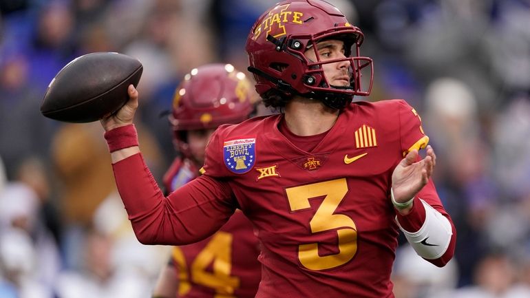 Iowa State quarterback Rocco Becht (3) looks to throw a...