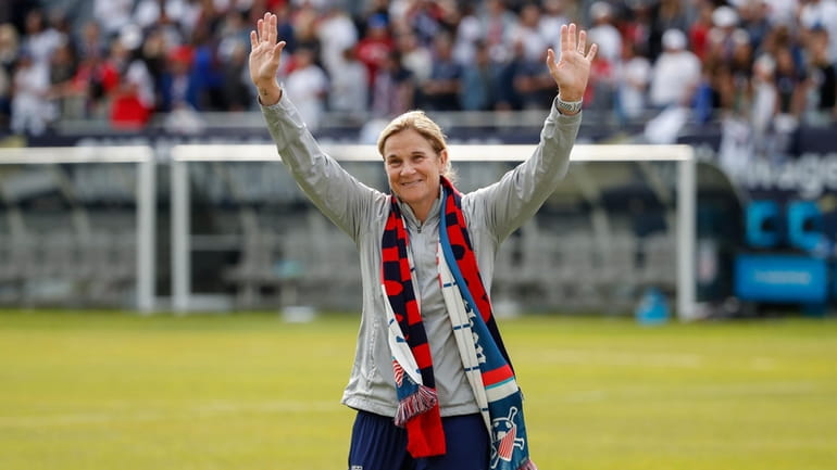 United States head coach Jill Ellis waves to the crowd...