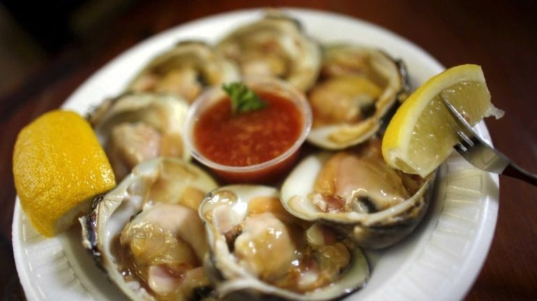 Clams on the half shell are served at Artie's South...