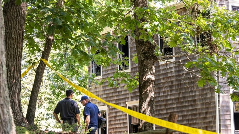 Fire swept through this rental home on Spring Lane in...