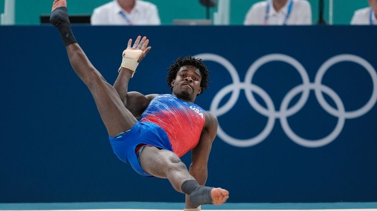 Frederick Richard, of the United States, performs on the floor...