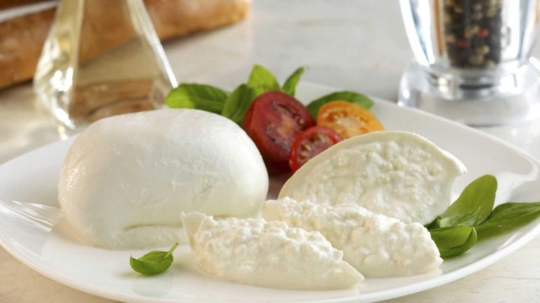 Burrata is a fresh cow's milk cheese composed of mozzarella...