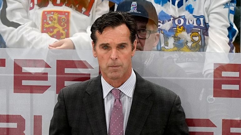 FILE - United States head coach David Quinn watches play...