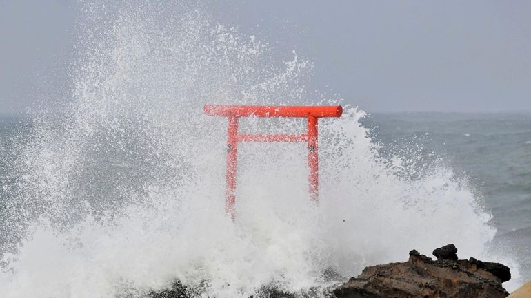 High waves hit a shore in Iwaki, Fukushima prefecture, northern...