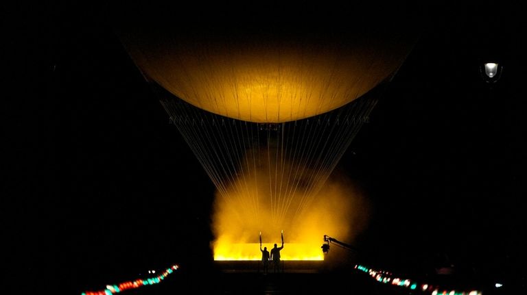 The cauldron rises in a balloon in Paris, France, during...