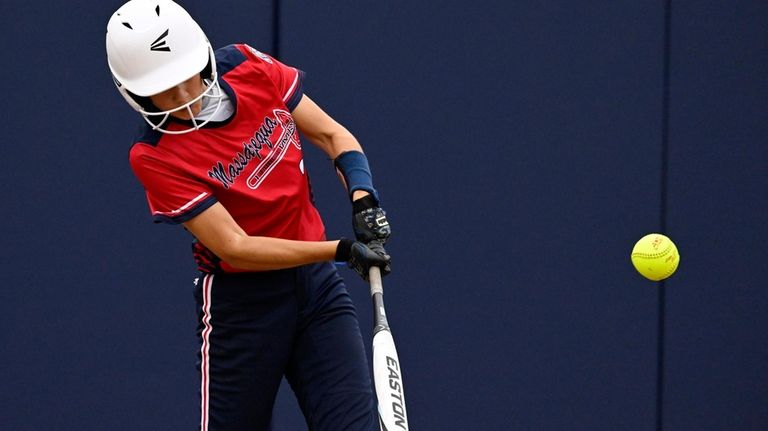 Massapequa's Mia Victor doubles in the first inning against Middletown Delaware...