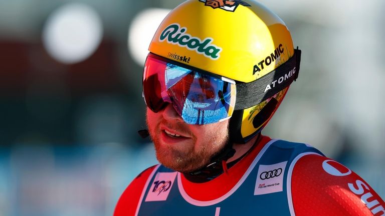 Switzerland's Niels Hintermann celebrates at the finish area of an...