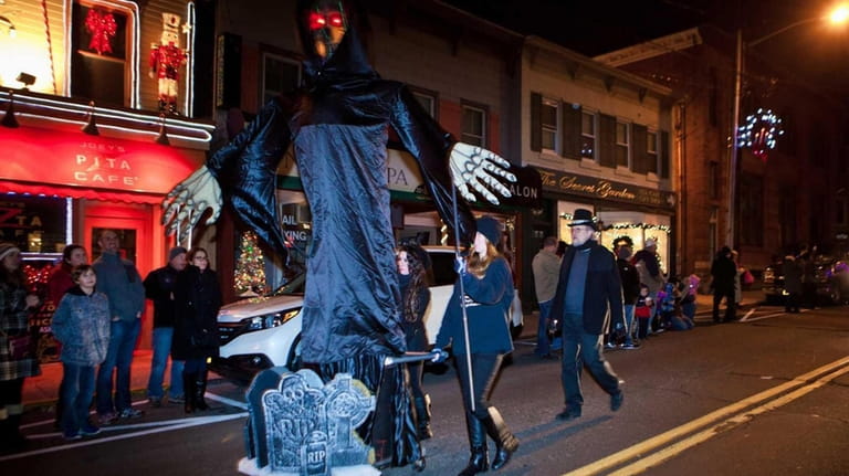 Giant puppets depicting the ghosts in "A Christmas Carol" are...